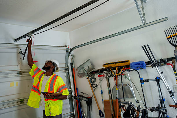 Professional Garage Door Panel Replacement technician working in North Gates, NY
